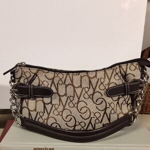New York & company elongated bag with silver hardware very good condition